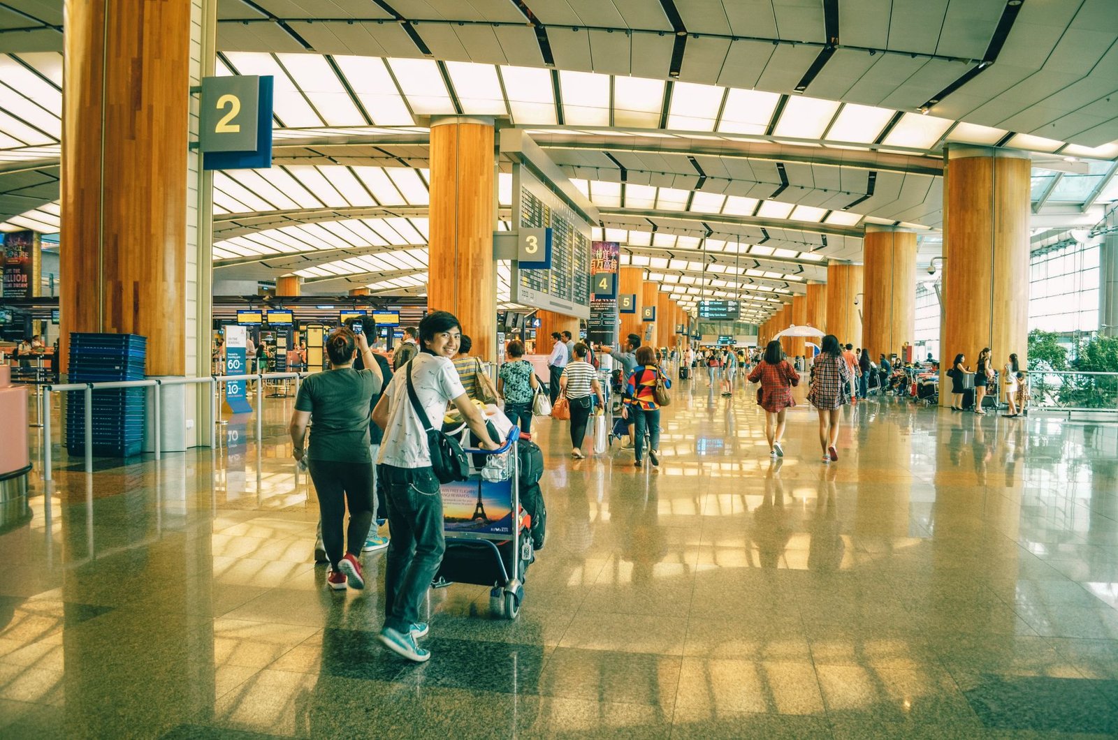 Man with luggage inside airport